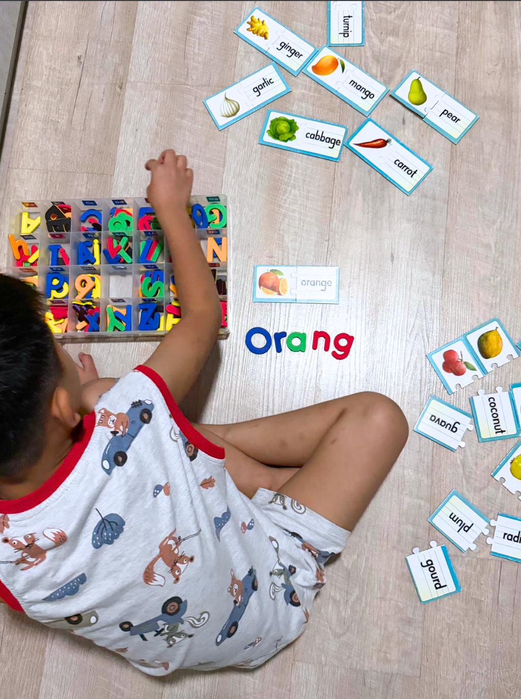 Child learning with educational flashcards